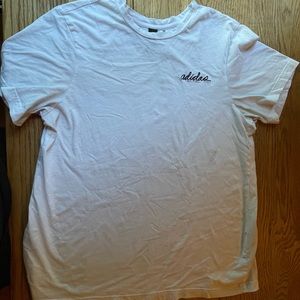 White adidas tshirt with cursive writing